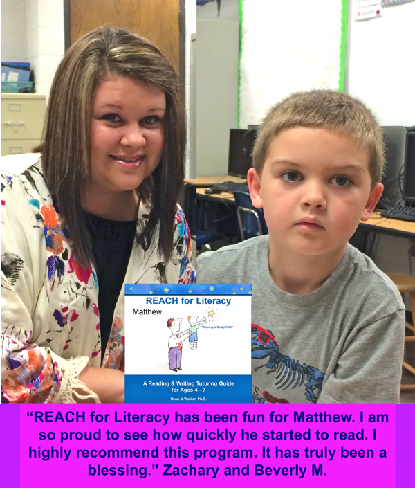 A woman and boy holding up a book.