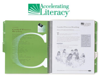 A green book with the words " accelerating literacy " on it.